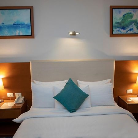 Rehana Plaza Hotel Le Caire Extérieur photo A bedroom at the hotel
