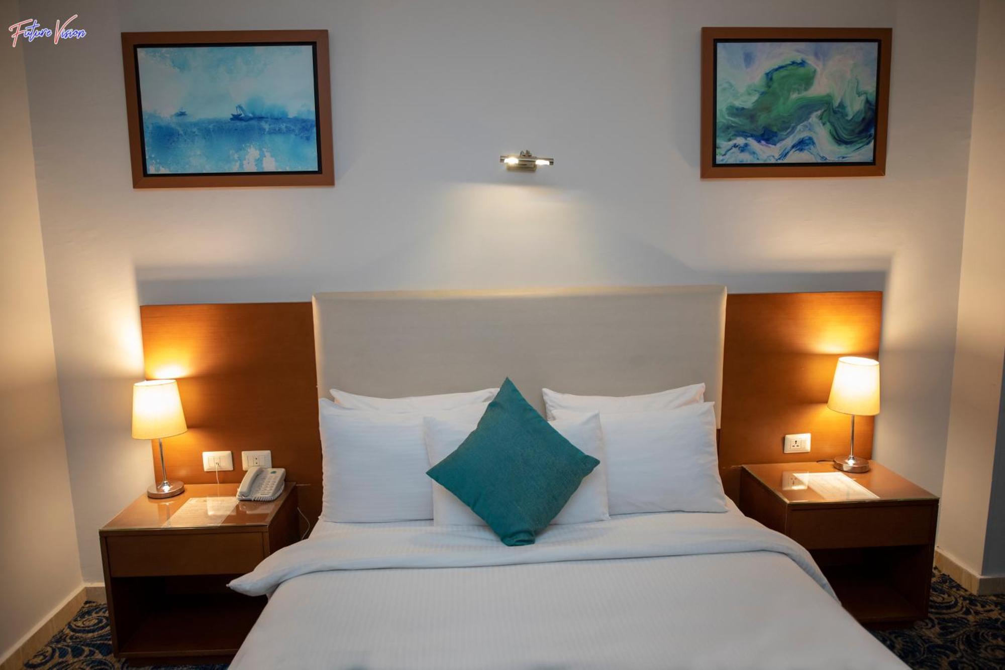Rehana Plaza Hotel Le Caire Extérieur photo A bedroom at the hotel