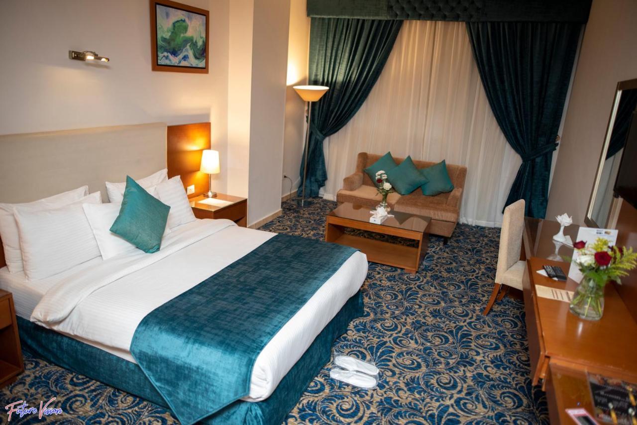 Rehana Plaza Hotel Le Caire Extérieur photo A room at the hotel